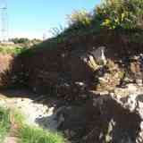 Click para ampliar. Corte en la muralla del Castro das Travesas. Carral (Coruña).